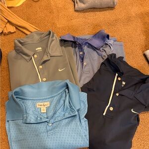 Set of four men’s golf shirts.
